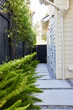 © Trinette Reed/Stocksy - Concrete pavers for walkway in landscaping of home