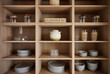 © Trinette Reed/Stocksy - Storage shelves in modern design kitchen
