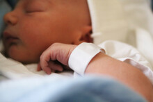 Newborn Baby At Hospital With Identity Tag 