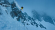 © Ibex.media/Stocksy - Skier dropping in