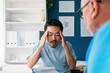 © Studio Firma/Stocksy - Doctor Examining Young Man