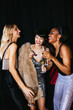 © BONNINSTUDIO/Stocksy - Girlfriends laughing during party