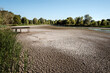 © Lea Csontos/Stocksy - Dried up lake as a result of climate change.