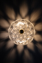 Openwork Vintage Glass Sconce Lamp With Light Shadows On The Wall