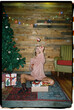© BONNINSTUDIO/Stocksy - User generated content happy woman with box of Christmas decorations