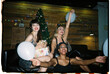© BONNINSTUDIO/Stocksy - User generated content diverse women resting on couch during party