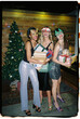 © BONNINSTUDIO/Stocksy - User generated content cool women with present boxes during Christmas