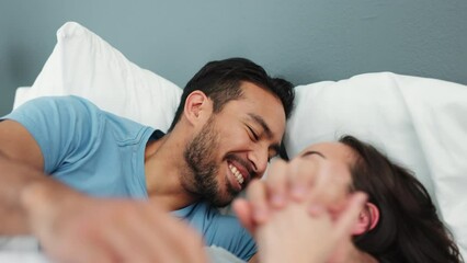 Poster - Young, happy and playful couple in bed in the morning, smiling and laughing. Mixed race man and asian woman in bedroom, having fun and showing affection. Bonding, loving and quality time