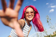 © VICTOR TORRES/Stocksy - Happy chinese woman with pink hair