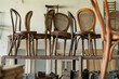 © Andriy Bezuglov/Stocksy - Vintage old chairs standing before the renovation at the repair place