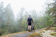 Bicycle riding in the forest in the fog