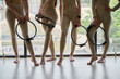 © Iuliia Versta/Stocksy - the girls are standing with a pilates circles