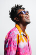 © VICTOR TORRES/Stocksy - Cheerful black man in trendy outfit