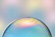 © Yaroslav Danylchenko/Stocksy - Soap bubble with iridescent flare.