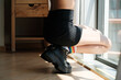 © Malquerida Studio/Stocksy - anonymous woman wearing rainbow socks