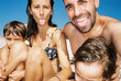 © BONNINSTUDIO/Stocksy - Family selfie in summer