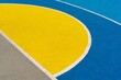 © Andriy Bezuglov/Stocksy - Corner of colourful newly made outdoor basketball court