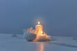 © Yaroslav Danylchenko/Stocksy - Natural quartz crystals and burning candles in dark