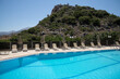 © Hernandez & Sorokina/Stocksy - Empty Idyllic Resort Pool In Mountains