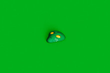 Alien Face On Green Background