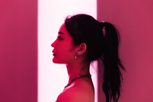 Profile Portrait Of An Asian Woman With Neon Light