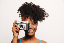 Smiling Black Woman With Vintage Photo Camera