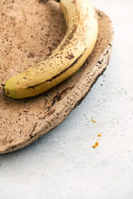 Over Ripe Banana On A Wooden Plate
