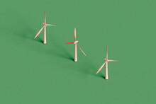 Three Pink Wind Turbines