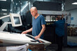 © ZQZ Studio/Stocksy - Asian workers in printing industry