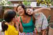 © Gemma can fly/Stocksy - Playing with happy grandmother