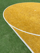 © Rene de Haan/Stocksy - sportfield with yellow shape