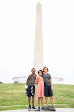 Siblings Pose Near Washington Monument