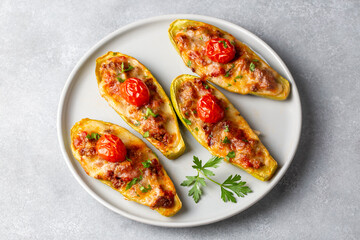 Wall Mural - Zucchini stuffed with meat, vegetables and cheese. Zucchini boats. Turkish name; kabak sandal