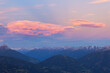 Alpenglow at dusk in the Alps mountains