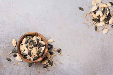 Wall Mural - Bowl with different seeds as snack, ingredient for oil, mix for healthy meal