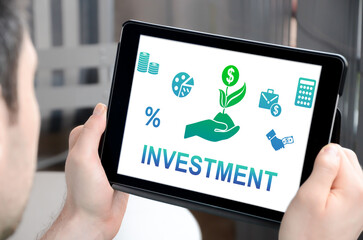 Wall Mural - Investment concept on a tablet