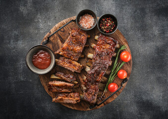 Wall Mural - Delicious barbecued ribs seasoned with a spicy basting sauce. Smoked American style pork ribs