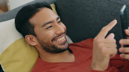 Sticker - Sofa, happy and relax man with phone scroll, browse or search social media app for comedy or funny meme. Person lounge on living room couch with happiness, mobile smartphone and reading online comic