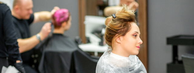 Wall Mural - Beautiful young blonde caucasian woman in the modern hair salon