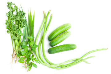 fresh vegetables variety, cucumber, ,spring onion, peppermint or mentha x piperita, ginger leaves, y