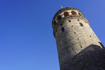 Istanbul, Turkey - Agust 08, 2022: The famous Galata tower in Istanbul, Turkey. This is a popular tourist attraction in the city. 