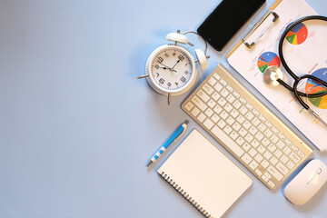 Canvas Print - Office desk with a laptop, supplies, and a tablet. Top view with copy space, financial concepts, web, wireless, work, and workplace.