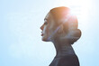 © fotofabrika - Silhouette of a woman on a blue background. Artificial intelligence and neural networks concept