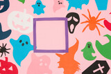 Fototapeta Dinusie - creative halloween background with frame as copy space, halloween paper monsters, paper craft, flat lay
