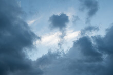 Blue Cumulus Clouds, One With A Cloud Looks Like A Heart. Romantic Sky.