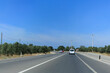 © Kozlik_mozlik - Highway wide road, transport and blue sky with clouds on a summer day