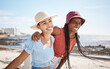 © Siphosethu F/peopleimages.com - Smile, love and gay or lesbian with black couple women bonding at beach or sea in summer. Freedom, happy and LGBT portrait of fun friends or girlfriend on holiday, vacation or honeymoon by the coast