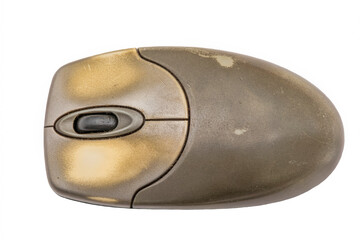 An old, long-used computer mouse with dirty fingerprints