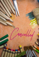 Poster - Overhead shot of school supplies with Cancelled text. Brushes, pencils, artistic tools. Art And Craft Work Tools.