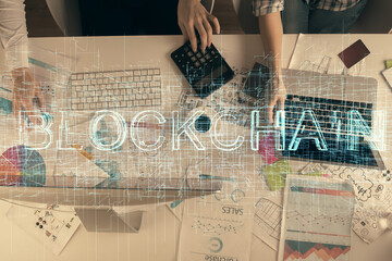 Aufkleber - Double exposure of man and woman working together and crypto finance theme hologram. Blockchain business concept. Computer background.